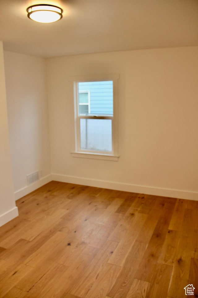 empty room featuring light hardwood / wood-style floors