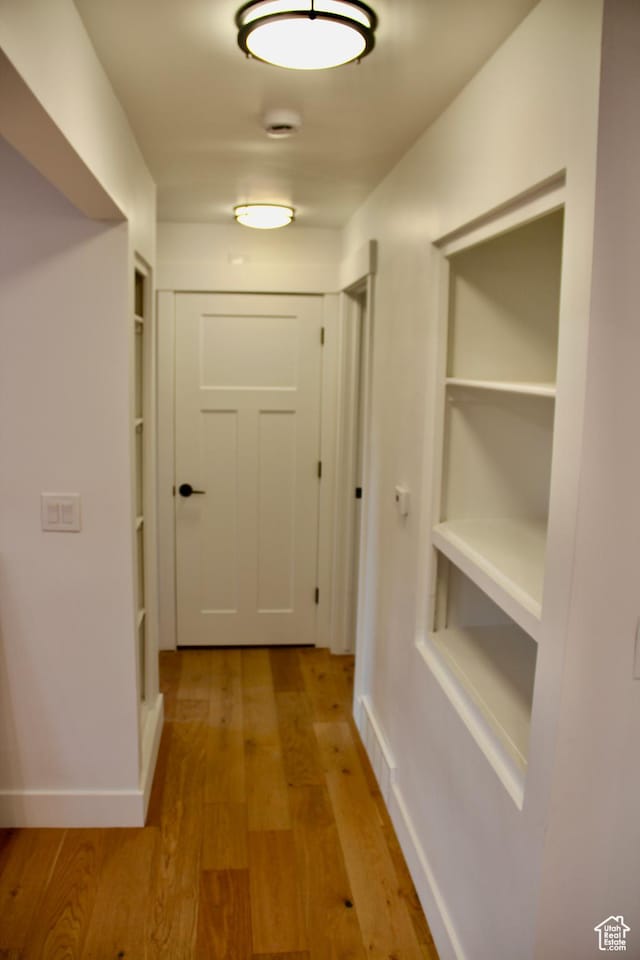 hall featuring light wood-type flooring