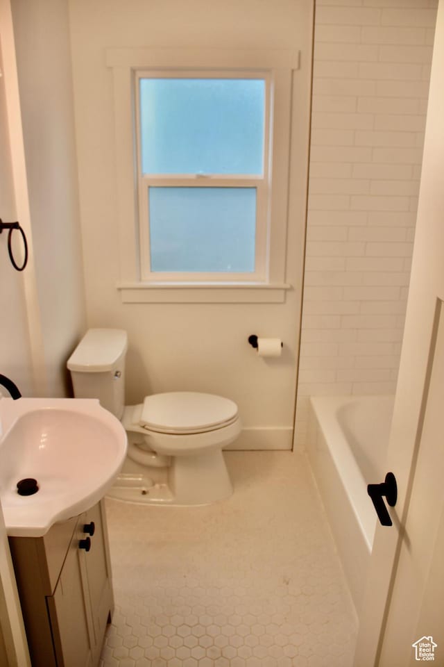 full bathroom with vanity, toilet, tile patterned flooring, and plus walk in shower