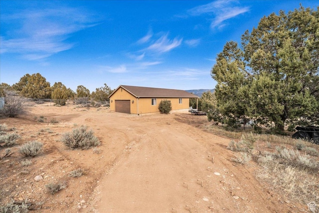 23 S 1200 W, Kanarraville, UT 84742 - ranch-style home featuring a garage