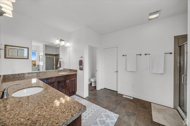23 S 1200 W, Kanarraville, UT 84742 - bathroom featuring vanity, toilet, and a shower with door