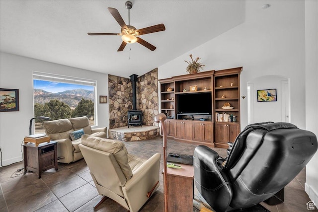 23 S 1200 W, Kanarraville, UT 84742 - living room featuring vaulted ceiling, ceiling fan, and a wood stove