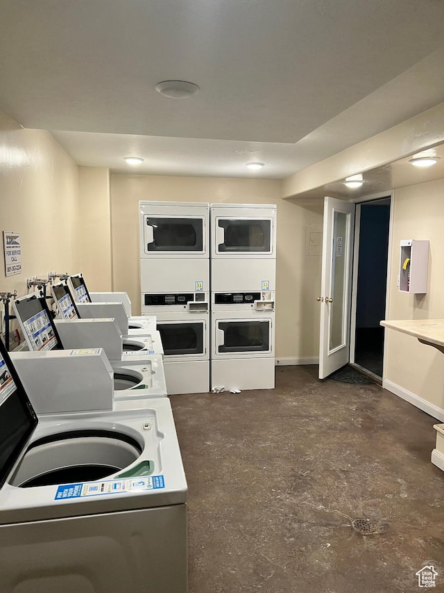 5676 Meadow Ln Unit 123, Ogden, UT 84403 - clothes washing area with stacked washer and dryer and washer and dryer