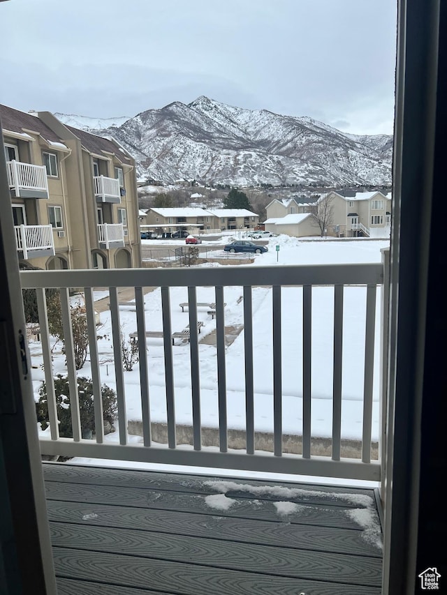 5676 Meadow Ln Unit 123, Ogden, UT 84403 - snow covered deck featuring a mountain view