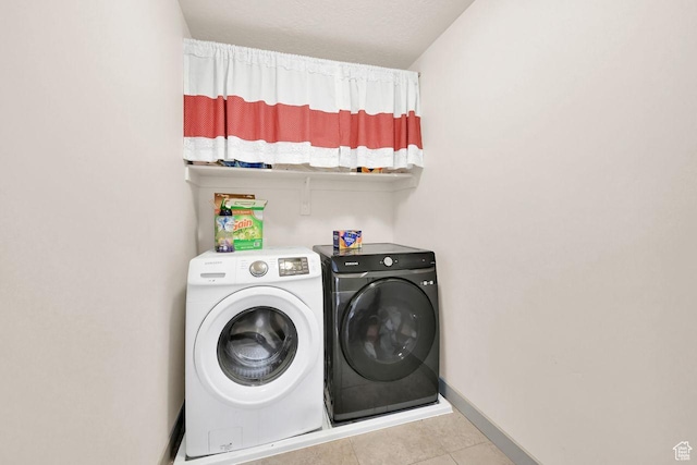 111 S 2300 W, Kaysville, UT 84037 - laundry room featuring laundry area, baseboards, tile patterned flooring, and washing machine and clothes dryer