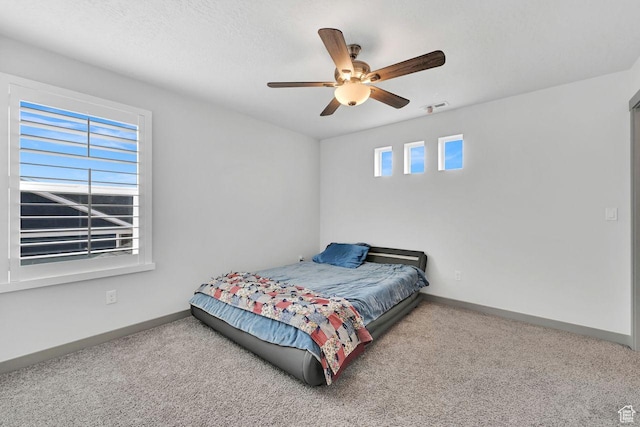 111 S 2300 W, Kaysville, UT 84037 - carpeted bedroom with baseboards and ceiling fan
