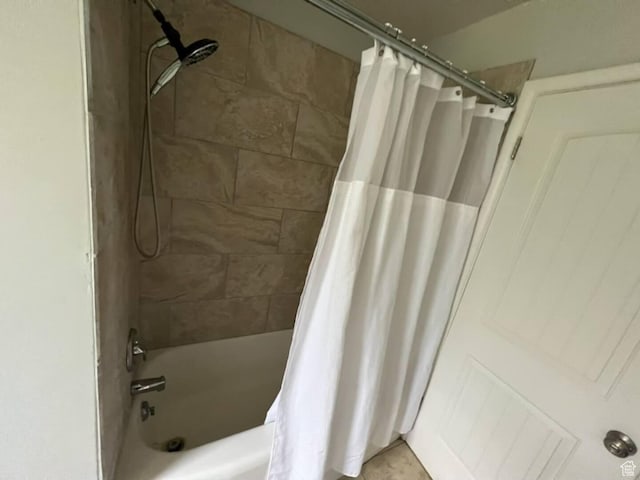 127 Mason Ln, North Salt Lake, UT 84054 - bathroom featuring shower / bathtub combination with curtain