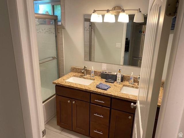 127 Mason Ln, North Salt Lake, UT 84054 - bathroom featuring vanity and shower / bath combination with glass door