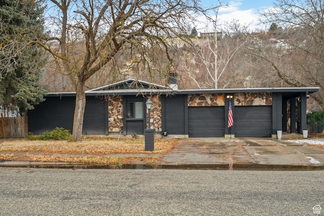 1078 Sumac Dr, Logan, UT 84321 - view of front of property with a garage and a carport