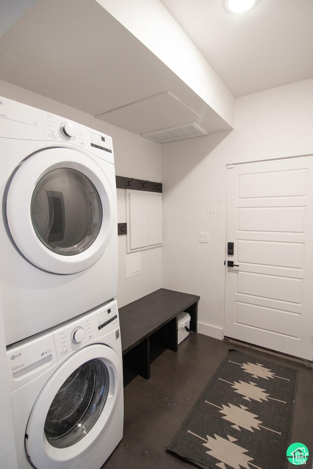 145 Crimson Cliffs Dr, Moab, UT 84532 - clothes washing area featuring stacked washer / dryer