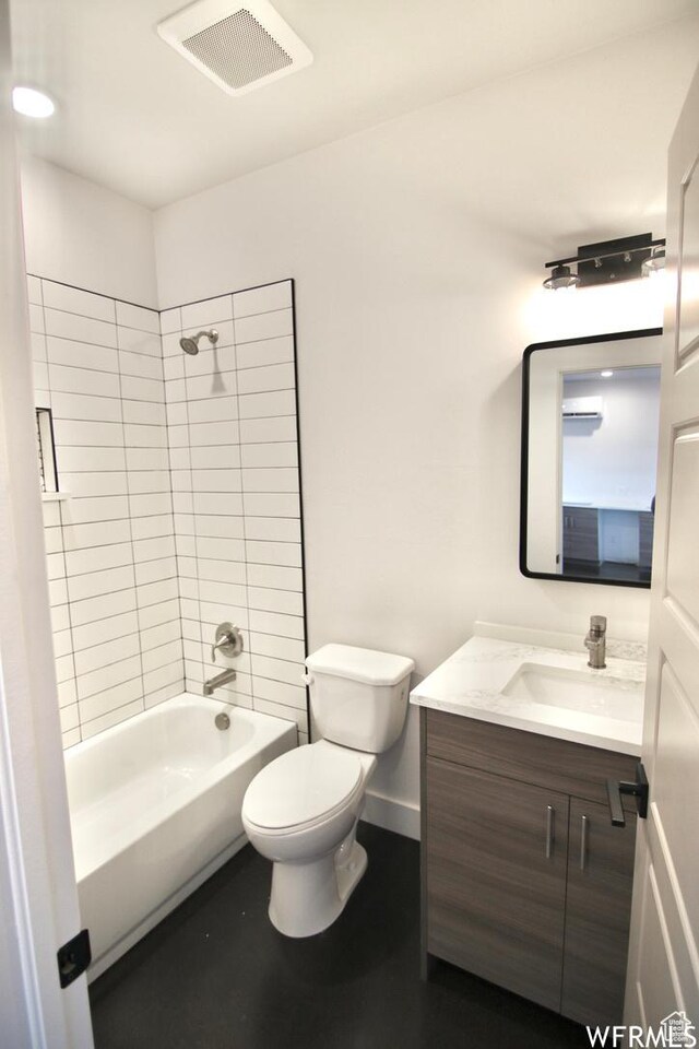 145 Crimson Cliffs Dr, Moab, UT 84532 - full bathroom with vanity, toilet, and tiled shower / bath