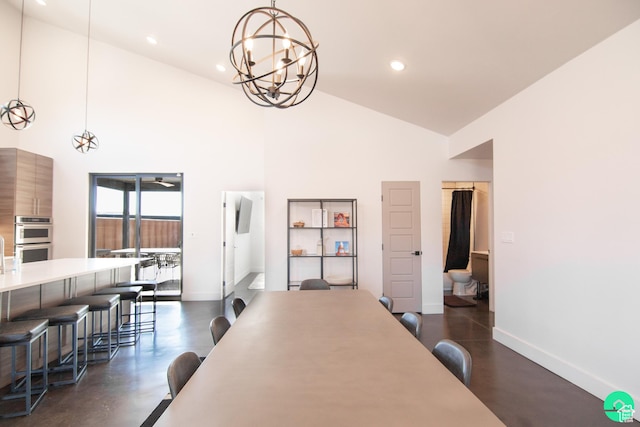 145 Crimson Cliffs Dr, Moab, UT 84532 - dining space featuring high vaulted ceiling and a chandelier