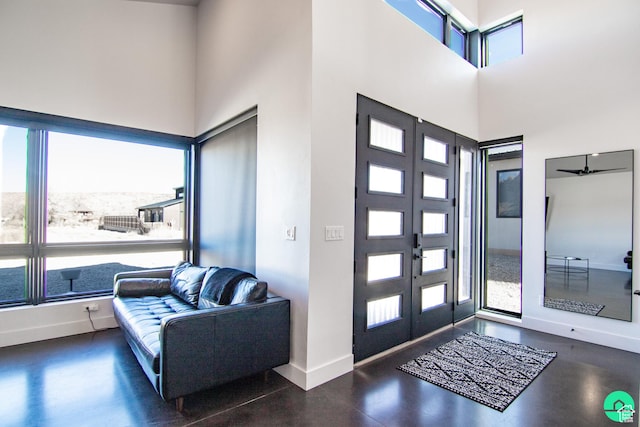 145 Crimson Cliffs Dr, Moab, UT 84532 - foyer entrance with french doors, a healthy amount of sunlight, and a high ceiling