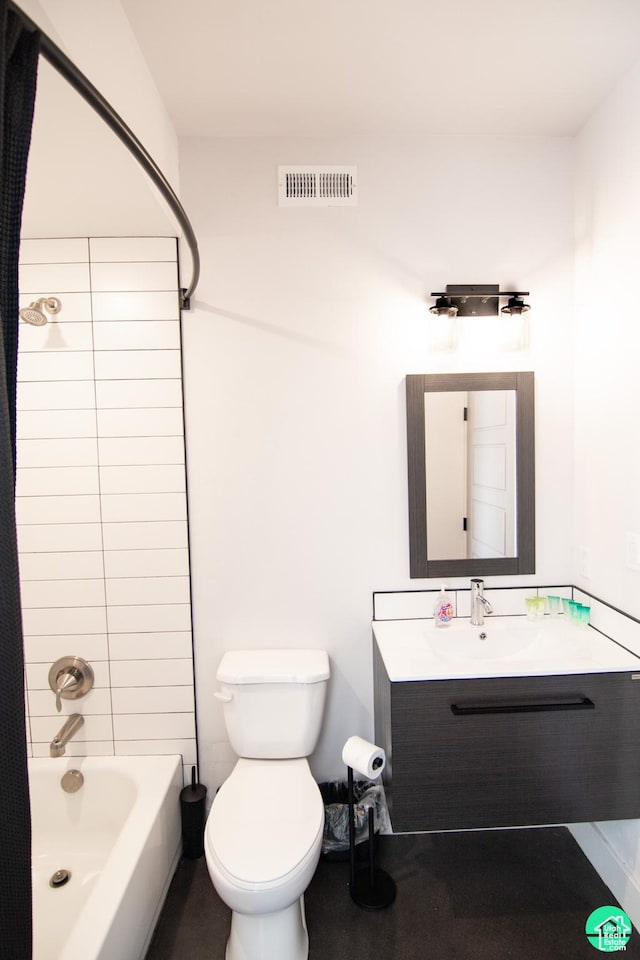 145 Crimson Cliffs Dr, Moab, UT 84532 - full bathroom with tiled shower / bath, vanity, and toilet
