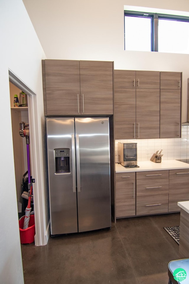 145 Crimson Cliffs Dr, Moab, UT 84532 - kitchen featuring stainless steel fridge with ice dispenser and backsplash