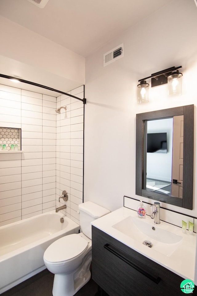 145 Crimson Cliffs Dr, Moab, UT 84532 - full bathroom with tiled shower / bath, vanity, and toilet