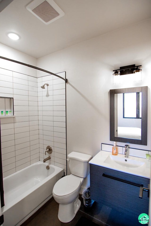 145 Crimson Cliffs Dr, Moab, UT 84532 - full bathroom with vanity, toilet, and tiled shower / bath combo