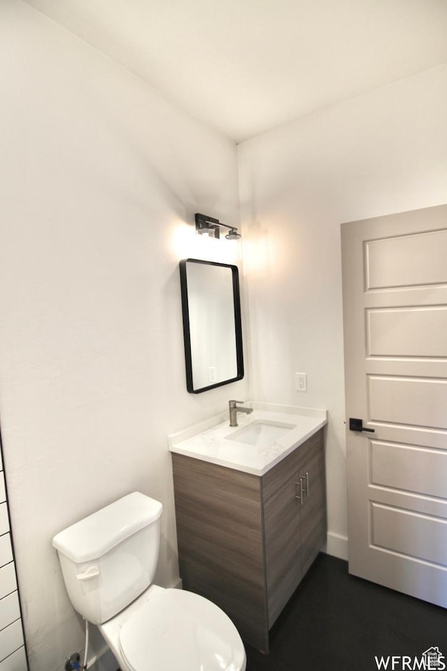 145 Crimson Cliffs Dr, Moab, UT 84532 - bathroom with vanity and toilet