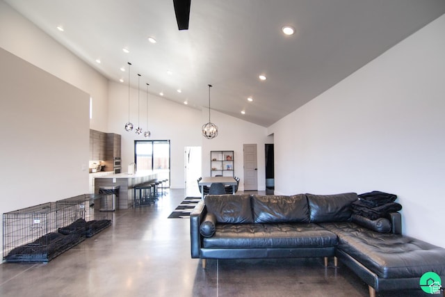 145 Crimson Cliffs Dr, Moab, UT 84532 - living room with high vaulted ceiling and an inviting chandelier