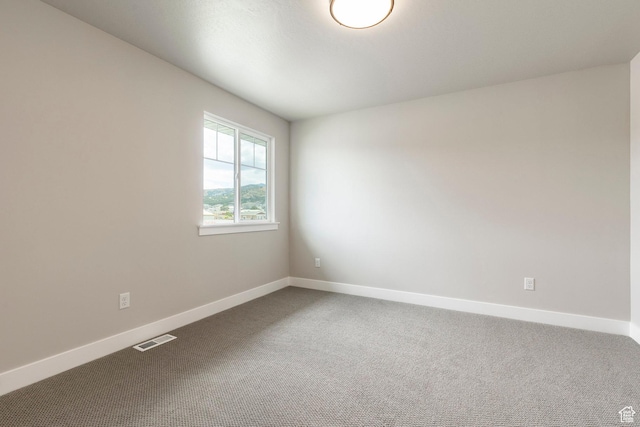 7288 W Hall Crossing Dr S, Herriman, UT 84096 - spare room featuring dark carpet