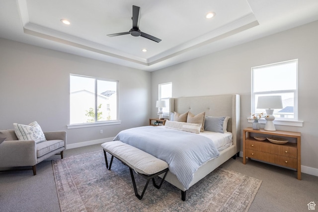 7288 W Hall Crossing Dr S, Herriman, UT 84096 - bedroom with a tray ceiling, light carpet, recessed lighting, and a ceiling fan