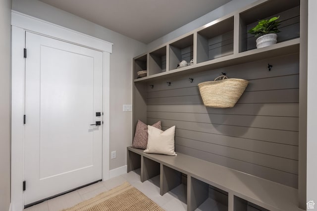 7288 W Hall Crossing Dr S, Herriman, UT 84096 - mudroom with light tile patterned floors and baseboards