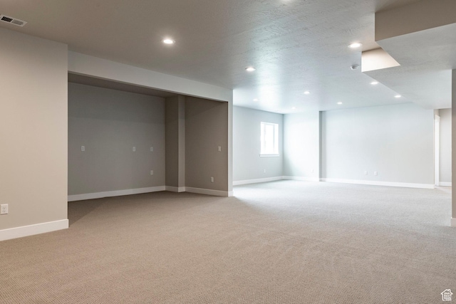 7288 W Hall Crossing Dr S, Herriman, UT 84096 - basement with light carpet and recessed lighting