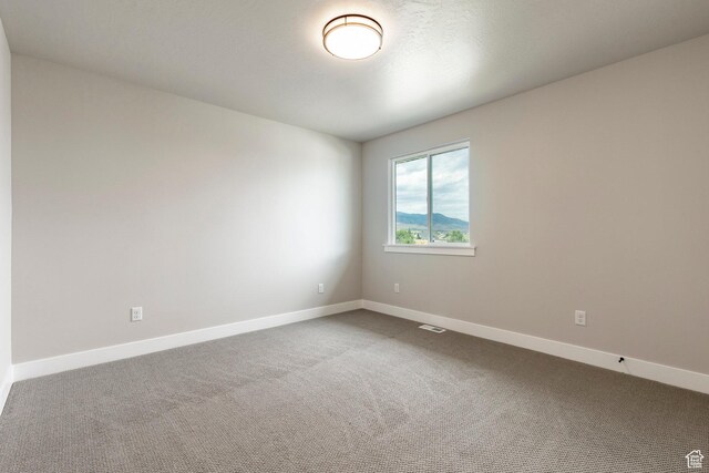 7288 W Hall Crossing Dr S, Herriman, UT 84096 - carpeted spare room with baseboards