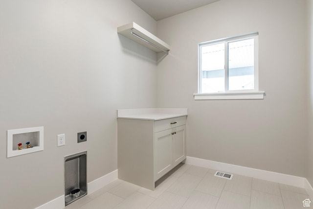 7288 W Hall Crossing Dr S, Herriman, UT 84096 - laundry area featuring hookup for an electric dryer, hookup for a washing machine, and cabinet space