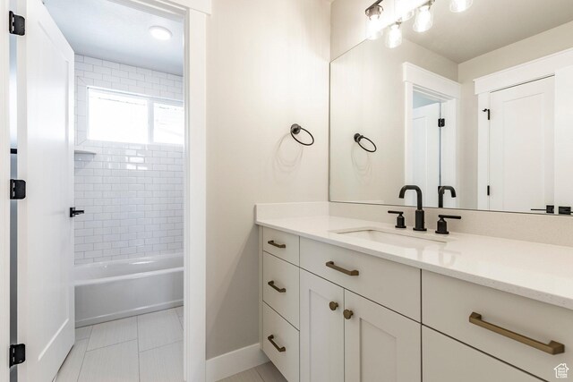 7288 W Hall Crossing Dr S, Herriman, UT 84096 - full bathroom with vanity, bathing tub / shower combination, and tile patterned floors