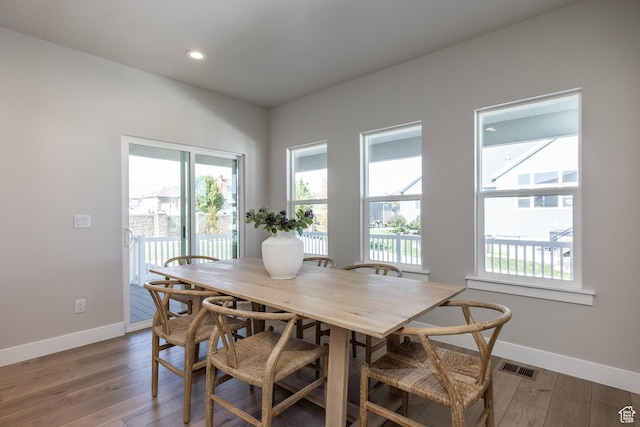 7288 W Hall Crossing Dr S, Herriman, UT 84096 - dining area with healthy amount of natural light, light wood-style floors, and recessed lighting