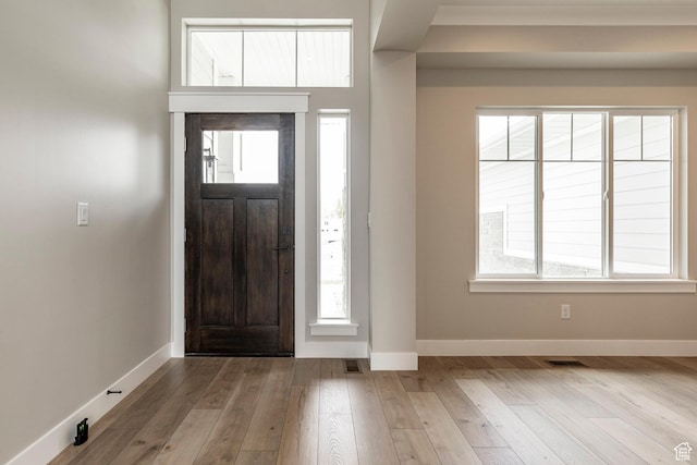 7288 W Hall Crossing Dr S, Herriman, UT 84096 - foyer entrance with hardwood / wood-style floors and baseboards