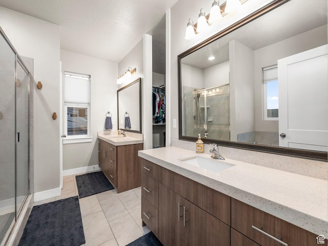 1352 E Abigail Ln, Eagle Mountain, UT 84005 - bathroom with walk in shower, vanity, and tile patterned flooring