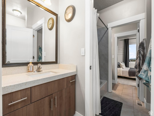 1352 E Abigail Ln, Eagle Mountain, UT 84005 - bathroom featuring tile patterned flooring, vanity, and shower / bath combo with shower curtain