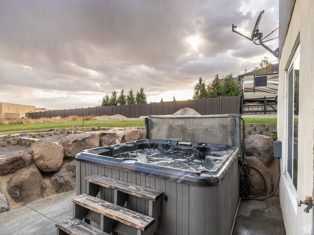1352 E Abigail Ln, Eagle Mountain, UT 84005 - view of patio featuring a hot tub