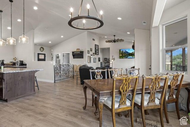 711 W Main St, Enterprise, UT 84725 - dining space featuring lofted ceiling and light wood-type flooring