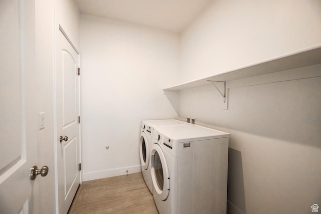 651 W Owen Dr, St George, UT 84790 - washroom with light hardwood / wood-style floors and washer and clothes dryer