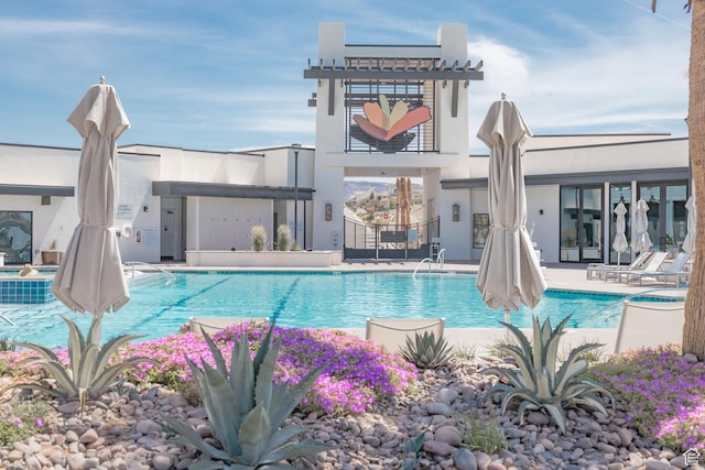 651 W Owen Dr, St George, UT 84790 - back of property with a patio and a community pool
