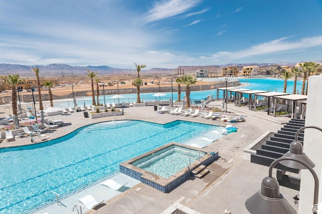 651 W Owen Dr, St George, UT 84790 - view of pool featuring a patio area, a mountain view, and a hot tub