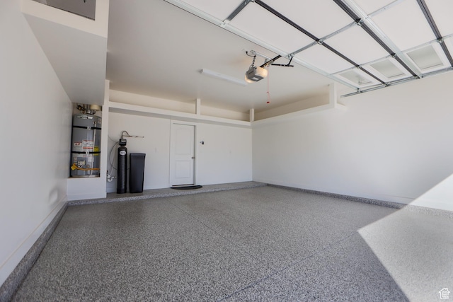 651 W Owen Dr, St George, UT 84790 - garage with a garage door opener and secured water heater