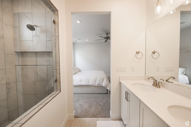 651 W Owen Dr, St George, UT 84790 - bathroom featuring ceiling fan, a tile shower, and vanity
