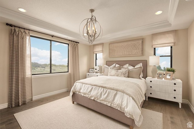 6187 W Wapiti Ridge Ln Unit 334, Herriman, UT 84096 - bedroom with crown molding, dark hardwood / wood-style floors, a raised ceiling, and a textured ceiling