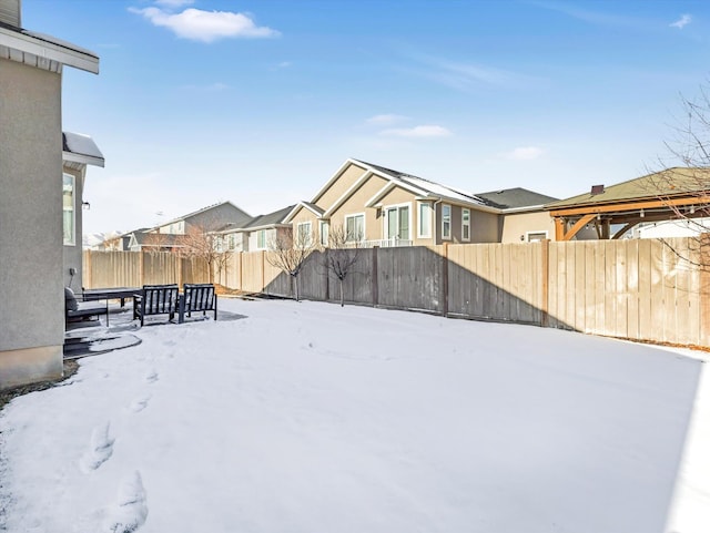 view of yard covered in snow