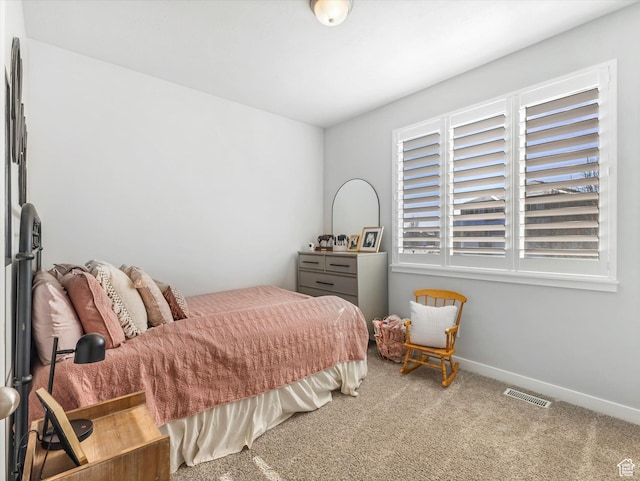 bedroom featuring carpet