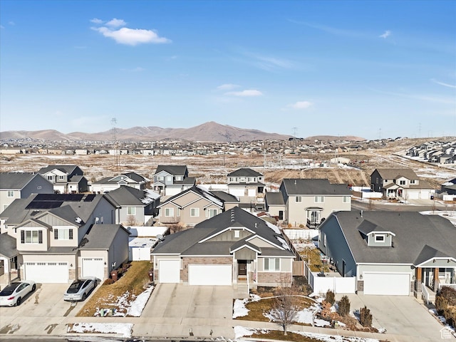 drone / aerial view featuring a mountain view