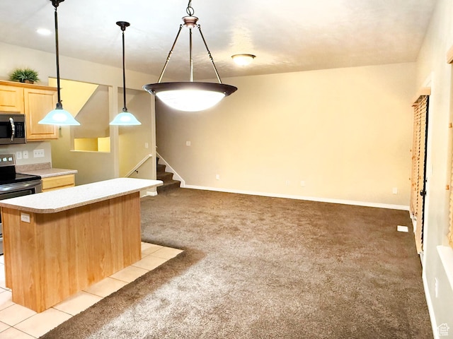 127 E Chandlerpoint Way S, Draper, UT 84020 - kitchen with a center island, light brown cabinetry, light colored carpet, light countertops, and stainless steel appliances