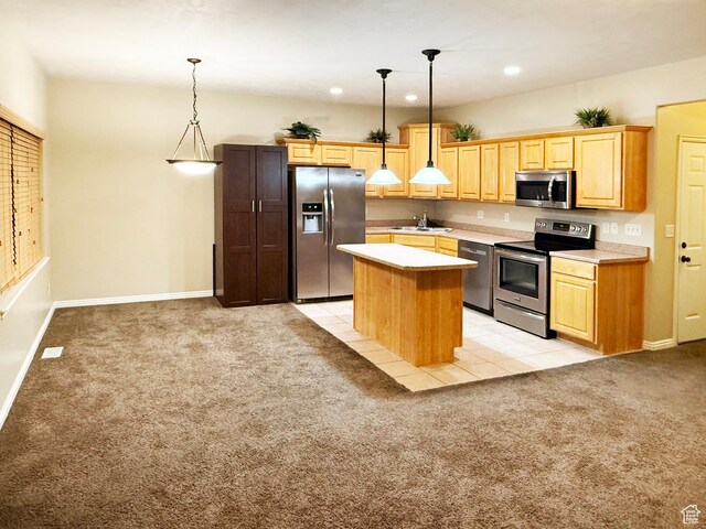 127 E Chandlerpoint Way S, Draper, UT 84020 - kitchen featuring light carpet, pendant lighting, a kitchen island, stainless steel appliances, and light countertops