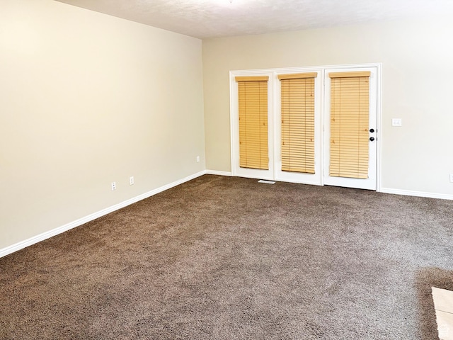 127 E Chandlerpoint Way S, Draper, UT 84020 - empty room with baseboards and dark colored carpet
