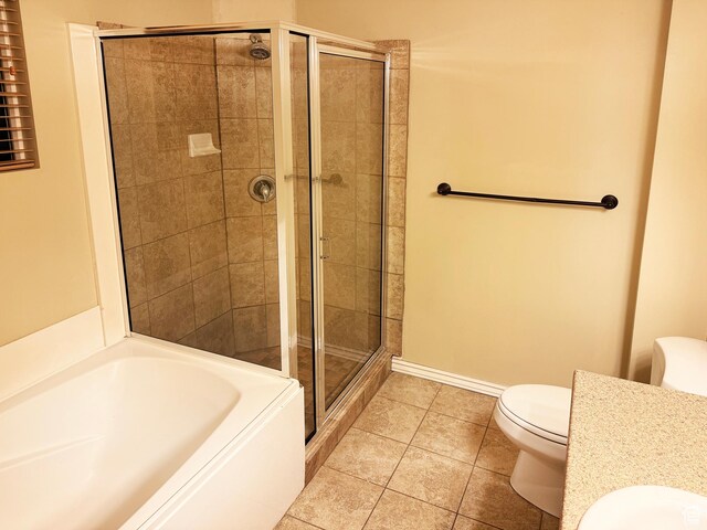 127 E Chandlerpoint Way S, Draper, UT 84020 - bathroom with a shower stall, tile patterned floors, baseboards, toilet, and a bath