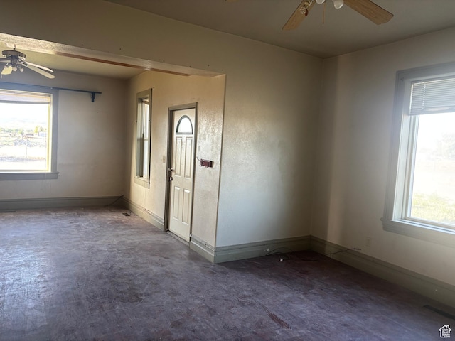 105 W 400 N, Centerfield, UT 84622 - empty room featuring a ceiling fan, healthy amount of natural light, and baseboards